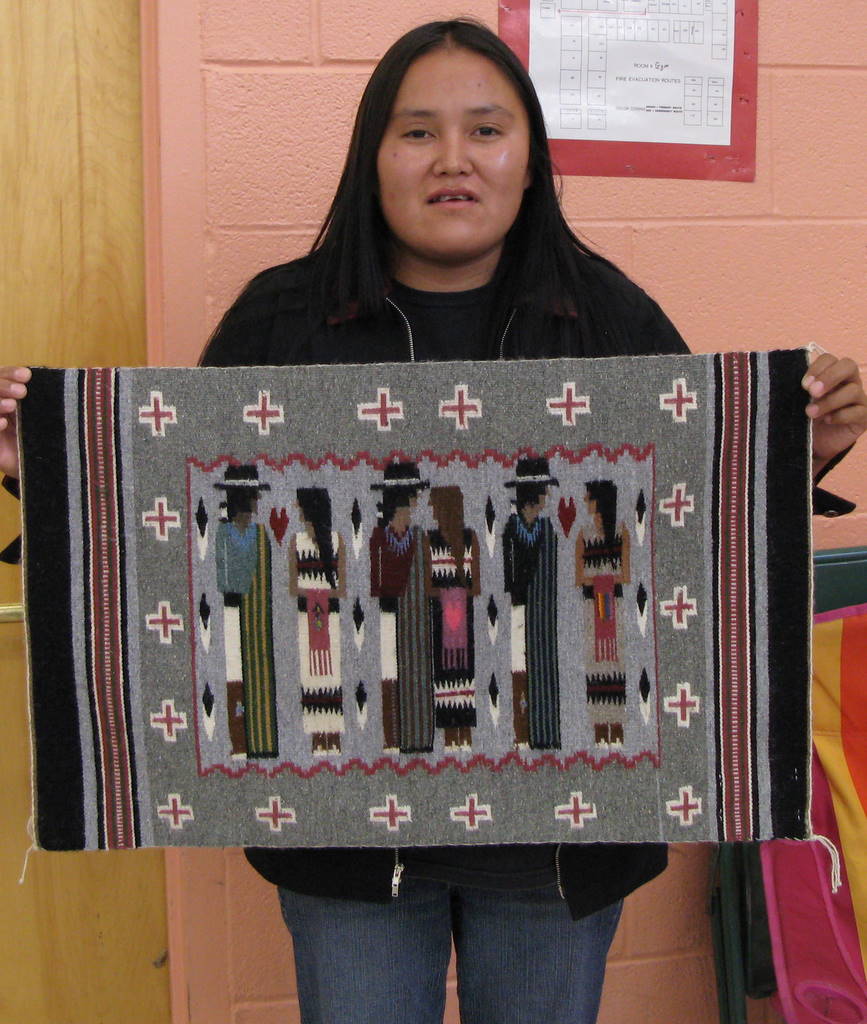 Ursula Begay with her rug