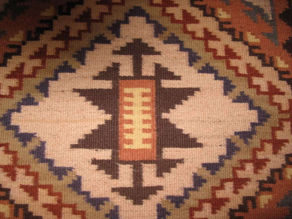 Center motif detail of Rebecca Tso's Storm Pattern rug