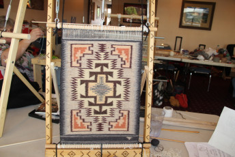 One of Jennie Slick's small rugs on the loom.  This is on the large loom