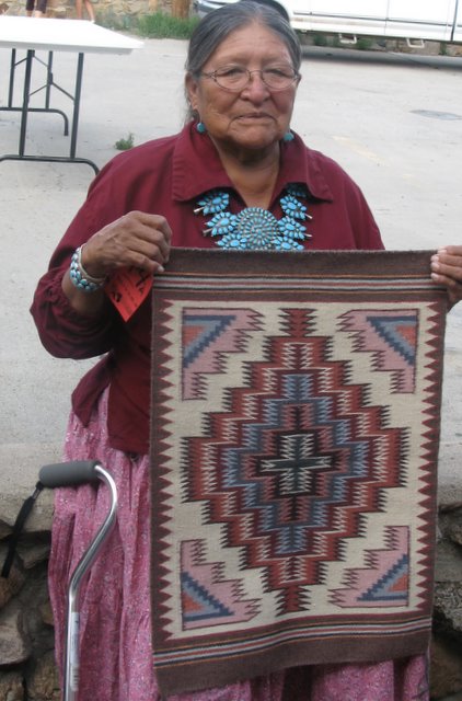 Rose Yazzie with Burntwater rug.  