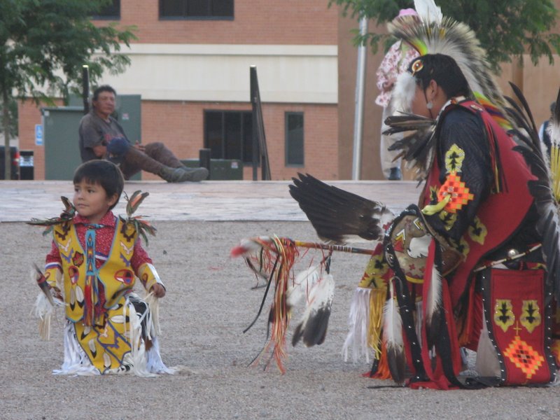 A young dancer learns his moves at the nighly Gallup Native American dance series.