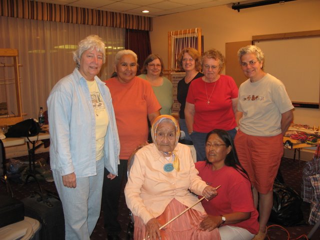 Helen Yazzie with our weaving seminar group.  From left, Roberta Sauerwein, Jennie Slick, Liz Munk, Laurie West, Barb Spelman and Mary Weinzirl.  In front, Helen Yazzie and granddaughter Lynelle Begay.