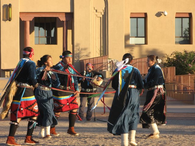 Rainbow Dance group at the McKinley County, NM Courthouse performing a sash belt dance.