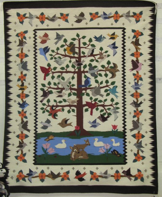 This ornate Tree of Life depicts a variety of birds and animals.