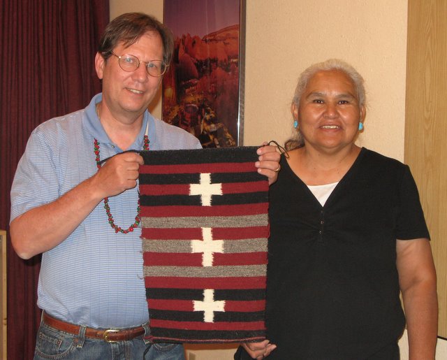 Bob Rosen and instructor Jennie Slick with Bob's completed rug.  What a great job!  
