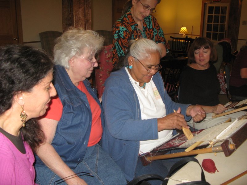 Jennie Slick demonstrates weaving for our workshop class. From left are Cheryl Holbert, Carole Kosturko, Jennie and Pat Shea.