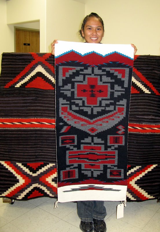 Cheyenne Flatrock with her contemporary weaving.  That's an 1880's blanket in the background. 