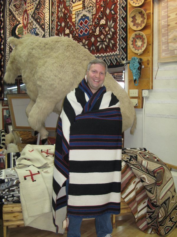 Thomas models a First Phase Chief Blanket at Richardson's Trading Company in Gallup, NM.  