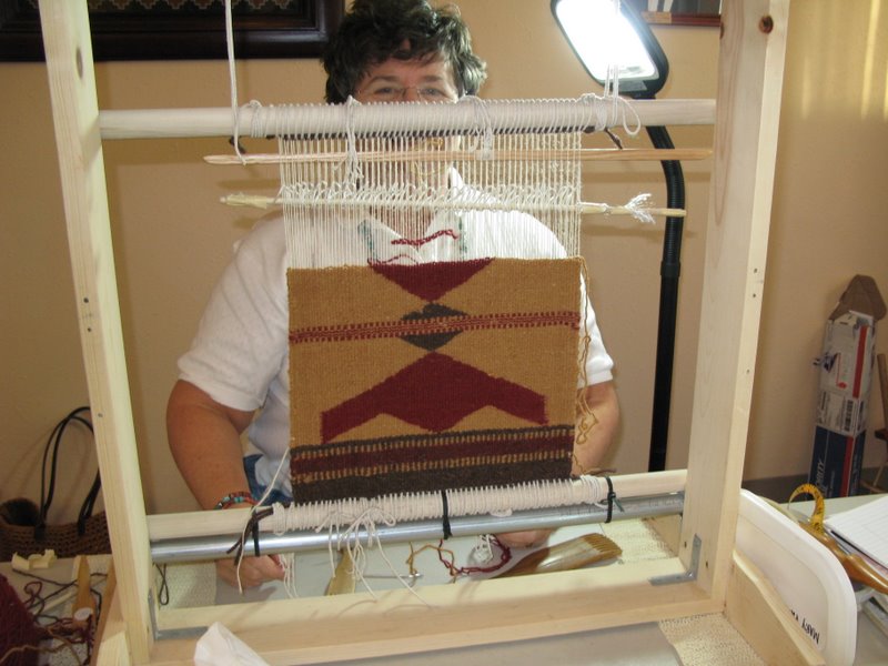 Mary Falzone's weaving enters the completion phase.