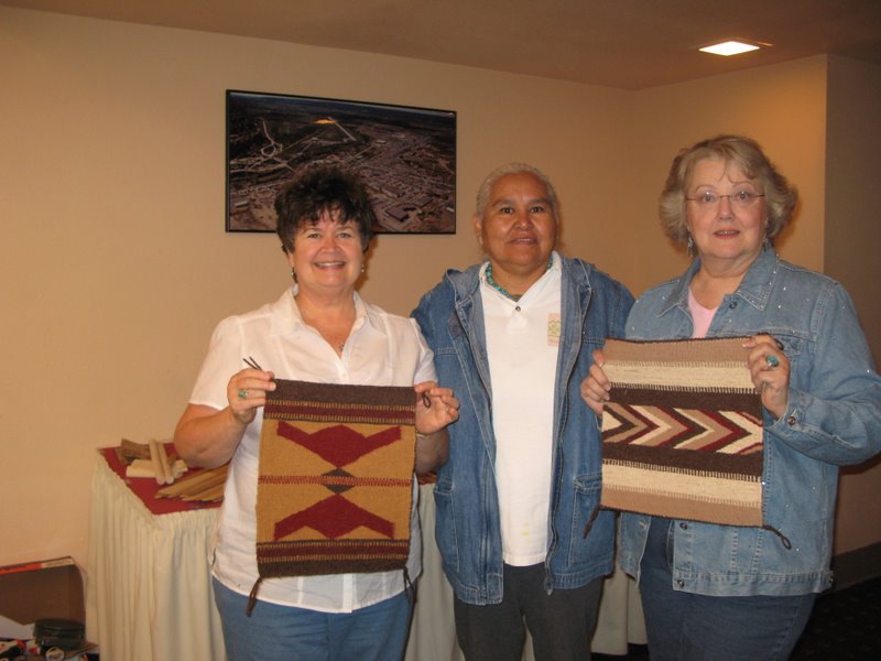 Mary Falzone (left) and Diane Craig (right) pose with Jennie Slick and their finished weavings.  Congratulations on a wonderful job!  