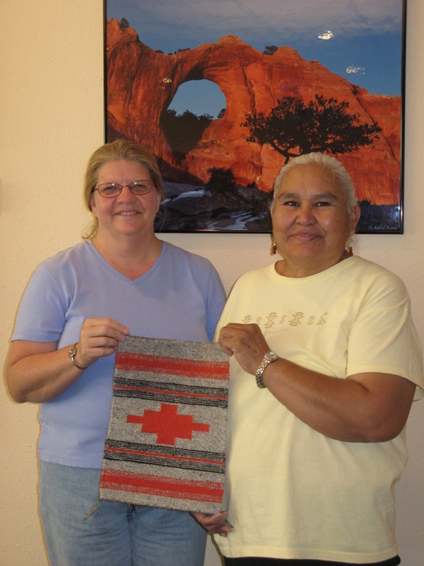 Debi Ward and Jennie Slick with Debi's first Navajo weaving.  It's beautiful. 