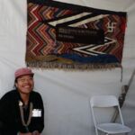 Tyrell's innovative weaving incorporates sends an affirming text message. It incorporates two outlining techniques, wedge weave and soumak embellishment.