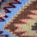 The outlining techniques that Tyrell used are generally described as Red Mesa Outlining. A close examination will show that one method comes to a single point while the other has two terminal points. Tyrell refers to these as male (two points) and female (one point) outlining. He learned the method from his uncle Roy Kady and Roy's mother, Mary.