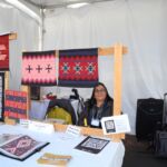 Lynda Teller Pete with 110+ wefts per inch tapestries by Lynda, her sister Barbara Teller Ornelas, and her nephew Michael Ornelas. That's right; 110+ wefts per inch.